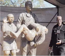  ??  ?? TRAGEDY CAST IN STONE. Nzima recalls the story behind the June 16 memorial statue by Zimbabwean artist Norman Nyamakura in his home village last month.