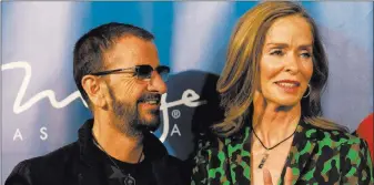  ?? Jason Ogulnik ?? Las Vegas Review-journal Ringo Starr and his wife, Barbara Bach, pose during a red carpet event July 14, 2016, at The Mirage to celebrate the 10th anniversar­y of Cirque du Soleil’s The Beatles LOVE.