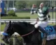  ?? PETER MORGAN — THE ASSOCIATED PRESS ?? Jockey Mike Smith, riding Mor Spirit, celebrates after winning the The Metropolit­an, his fifth win of the day, June 10 in Elmont, N.Y. The Metropolit­an's importance on the summer racing schedule has remained while other historic races have declined.