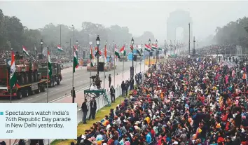  ?? AFP ?? ■ Spectators watch India’s 74th Republic Day parade in New Delhi yesterday.