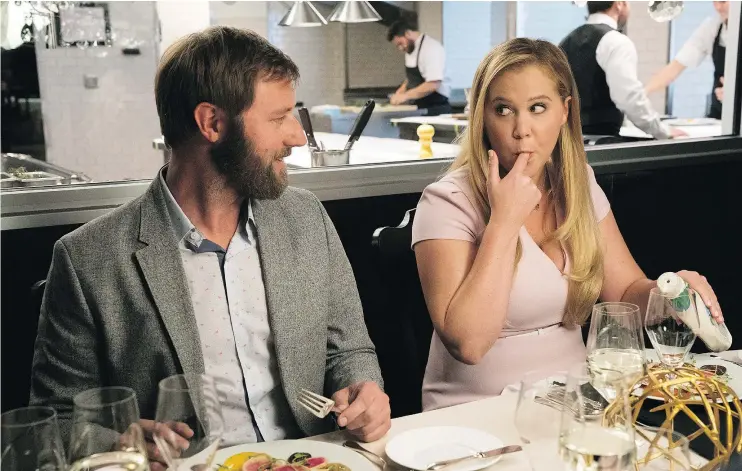  ?? — EONE FILMS ?? Rory Scovel and Amy Schumer star in I Feel Pretty, a movie the comedian says is really a satire of the near-impossible beauty standards society places on women.