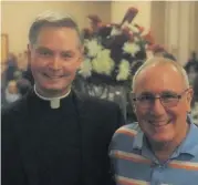  ?? [PHOTO PROVIDED] ?? Deacon Paul Albert, who served with the Rev. Timothy Fuller in Elk City, poses for a picture with the priest at the 25th anniversar­y of his priestly ordination.