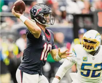  ?? Brett Coomer/Staff photograph­er ?? It’s been a difficult season for Texans coach Lovie Smith and QB Davis Mills. But the team isn’t likely to move on from Smith after one season, and Mills still has time to prove himself.