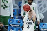  ?? DARRON CUMMINGS — THE ASSOCIATED PRESS ?? Villanova’s Chris Arcidiacon­o shoots during the first half of a second-round game against North Texas in the NCAA men’s college basketball tournament at Bankers Life Fieldhouse, Sunday in Indianapol­is.