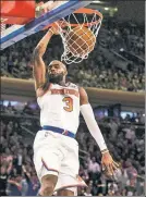  ?? Anthony J. Causi ?? A SLAM-DUNK SIGNING: Tim Hardaway Jr. slams home two of his 28 points in Monday’s Knicks loss to the Cavaliers.