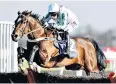  ??  ?? In the clear: Redicean, ridden by Wayne Hutchinson, jumps the last at Kempton