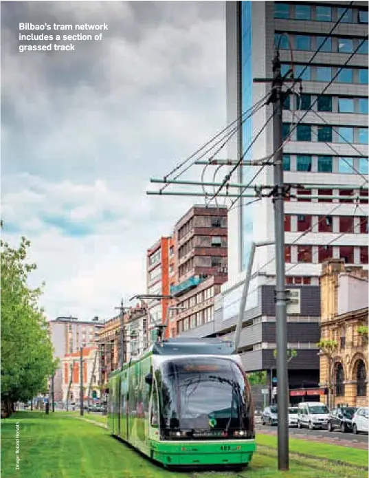  ??  ?? Bilbao's tram network includes a section of grassed track