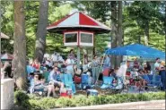  ??  ?? Many came with lawn chairs and coolers to Travers Day 2016.