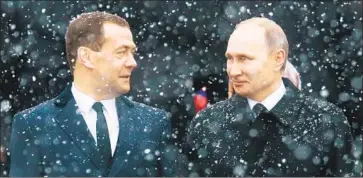  ?? Ivan Sekretarev Associated Press ?? RUSSIAN President Vladimir Putin has accepted the resignatio­n of Prime Minister Dmitry Medvedev, left.