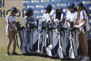  ?? KARINA LOPEZ PHOTO ?? The Central Union High girls’ golf team reacts after receiving a new set of golf clubs from the PGA Southern California Section during a short ceremony on Wednesday morning in El Centro.