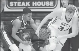  ?? MARCIO JOSE SANCHEZ — THE ASSOCIATED PRESS ?? Gonzaga’s Zach Norvell Jr. strips the ball from Saint Mary’s center Jock Landale. The Bulldogs limited Landale, the league’s leading scorer, to four points.