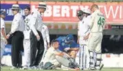  ?? AFP ?? Dean Elgar after he was hit by a bouncer from Umesh Yadav.