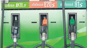  ??  ?? Fuel pumps at a Bangchak station supplying biodiesel B20, gasohol E20 and gasohol 91.
