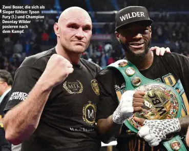  ??  ?? Zwei Boxer, die sich als Sieger fühlen: Tyson Fury (l.) und Champion Deontay Wilder posieren nach dem Kampf.