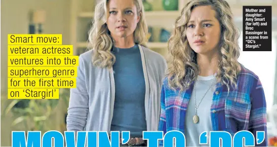  ??  ?? Mother and daughter: Amy Smart (far left) and Brec Bassinger in a scene from “DC’s Stargirl.”