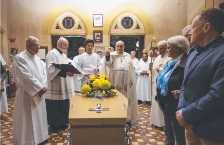  ?? The final farewell for Archbishop Leonard Faulkner Picture: BEN MACMAHON ??