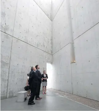  ?? ADRIAN WYLD/THE CANADIAN PRESS ?? Prime Minister Justin Trudeau tours the National Holocaust Monument at Booth and Wellington Streets with Minister of Canadian Heritage Melanie Joly and survivor Philip Goldig on Wednesday.