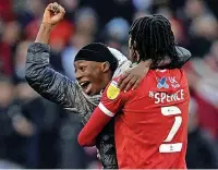  ?? ?? OFF THE PITCH A fan celebrates with Forest’s Djed Spence