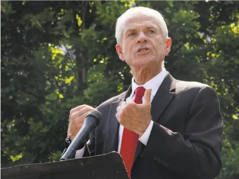  ?? Samuel Corum / New York Times ?? White House trade adviser Peter Navarro speaks to reporters early this month, promising action against Chinese social media apps.