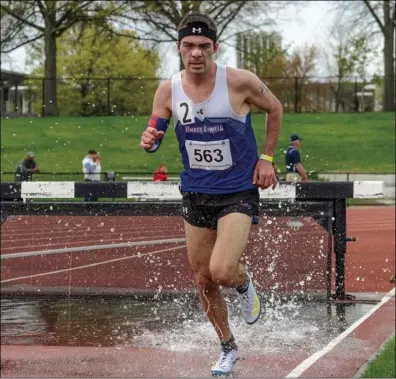  ?? File photo ?? Cumberland High grad and current UMass-Lowell grad student Ben Drezek recently won the American East 3,000-meter steeplecha­se title while working toward his doctorate degree.