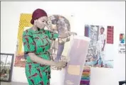  ??  ?? NJIDEKA Akunyili Crosby, a Los Angeles artist whose work sold for $1.1 million, is featured in film.