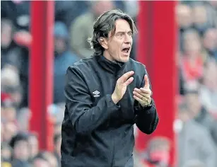  ?? Picture: AFP / DANIEL LEAL-OLIVAS ?? ALL THE WAY: Brentford are pushing hard for a return to the English top-flight after more than 70 years away, with
Danish manager Thomas Frank saying their success is partly down to their values-driven approach.