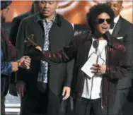  ?? THE ASSOCIATED PRESS ?? Bruno Mars accepts the award for song of the year for “That’s What I Like” at the 60th annual Grammy Awards at Madison Square Garden on Sunday in New York.