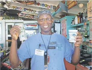  ?? PHOTO BY STEVE MACNAULL ?? Bartender Mic at the Soggy Dollar Bar on Jost van Dyke in the British Virgin Islands will let you pay for your Painkiller with wet money.