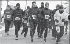  ?? ERIC BOURQUE ?? Some of the participan­ts in last year’s Boxing Day 5K (Turkey Run) in Yarmouth. The 2017 event was held on a blustery, frigid morning.