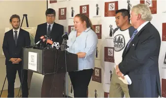  ?? Alejandro Serrano / The Chronicle ?? Wendy Towner, one of the victims, talks at a press conference Tuesday in S.F. announcing a lawsuit filed on behalf of five people who were wounded in the Gilroy Garlic Festival shooting.