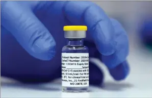  ?? The Associated Press ?? A vial of the Phase 3 Novavax coronaviru­s vaccine is seen at St. George’s University hospital in London. Novavax said Thursday its COVID-19 vaccine appears 89% effective based on early findings from the British study and it also seems to work — though not as well — against new mutated strains of the virus circulatin­g in that country and South Africa.