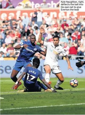  ??  ?? Kyle Naughton, right, deflects the ball into his own net to give Everton the lead