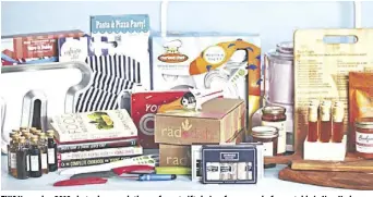  ?? AP ?? This November 2019 photo shows a plethora of great gift choices for young chefs on a table in New York. From cooking kits to ice-cream makers to books to flights of honey, there are lots of way to fuel a budding cook’s interest.