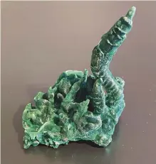  ??  ?? Dick Graeme willingly shared his knowledge and collected specimens, as he did with this malachite stalactite, which is now in the Jones collection.