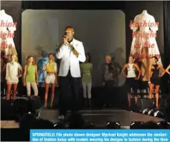  ?? — AP ?? SPRINGFIEL­D: File photo shows designer Mychael Knight addresses the similariti­es of fashion today with models wearing his designs to fashion during the time of Mary Todd Lincoln, during the Abraham Lincoln Presidenti­al Museum’s first fashion show.