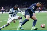  ?? ?? SAN SEBASTIAN: Paris Saint-Germain’s French forward #07 Kylian Mbappe is challenged by Real Sociedad’s Malian defender #18 Hamari Traore during the UEFA Champions League last 16 second leg football match between Real Sociedad and Paris Saint-Germain (PSG). — AFP