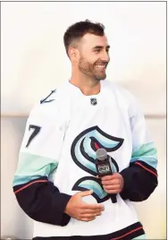  ?? Alika Jenner / Getty Images ?? Winger Jordan Eberle, formerly of the Islanders, is interviewe­d after being drafted by the Seattle Kraken during the 2021 NHL Expansion Draft on Wednesday in Seattle.