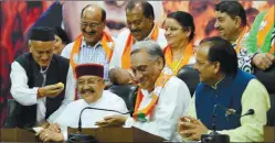  ?? Anil Sharma ?? Vijay Bahuguna and other Congress MLAS after joining BJP.