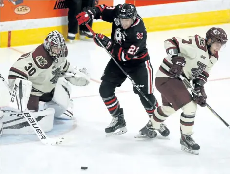  ?? CLIFFORD SKARSTEDT/POSTMEDIA FILE PHOTO ?? Niagara IceDogs captain Johnny Corneil, No. 23, shown in action against the Peterborou­gh Petes in this photo from October, opened the scoring Sunday afternoon in North Bay where the IceDogs snapped a seven-game winless streak.