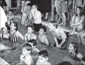  ?? B19twe02 ?? The Primary Schools swimming gala, which was held last Wednesday at the Kinloch pool, was as noisy as ever. Champions at the event were Penny Raeburn and Tom Wheeler.