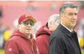  ?? JOHN MCDONNELL/THE WASHINGTON POST ?? Redskins owner Daniel Snyder, left, is keeping Bruce Allen, right, as the team’s president.