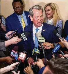  ?? JOHN SPINK/JOHN.SPINK@AJC.COM ?? After Republican­s said they mistrusted the voting process, Gov. Brian Kemp signed into law a package of bills that empower voter eligibilit­y challenges, require more audits and tighten ballot security.