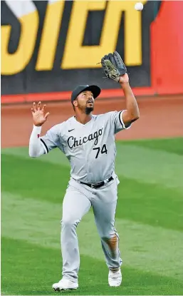  ?? GETTY IMAGES, AP ?? Sox third baseman Yoan Moncada (left) is under club control through 2025, and left fielder Eloy Jimenez is under club control through 2026.