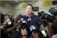  ?? NICK UT — THE ASSOCIATED PRESS ?? Los Angeles Lakers’ head coach Luke Walton talks to reporters during the team’s NBA basketball media day in El Segundo Monday.