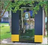  ?? PROVIDED TO CHINA DAILY ?? A man exercises in a compact Misspao gym booth in a residentia­l community in Beijing.