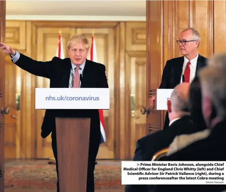  ?? Simon Dawson ?? > Prime Minister Boris Johnson, alongside Chief Medical Officer for England Chris Whitty (left) and Chief Scientific Adviser Sir Patrick Vallance (right), during a press conference­after the latest Cobra meeting