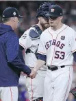  ?? TOM PENNINGTON/GETTY IMAGES ?? It was another rough outing for Astros closer Ken Giles Saturday as he gave up three runs in the ninth inning of L.A.’s 6-2 victory.