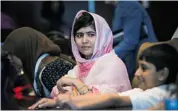  ?? Andrew Burton/getty Images ?? Pakistani advocate for girls’ education, Malala Yousafzai, 16, who was shot in the head by the Taliban, spoke at U.N.