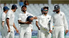  ?? AP ?? India’s cricketers leave the field after their victory over England by 203 run in the third test at Trent Bridge, Nottingham, yesterday.