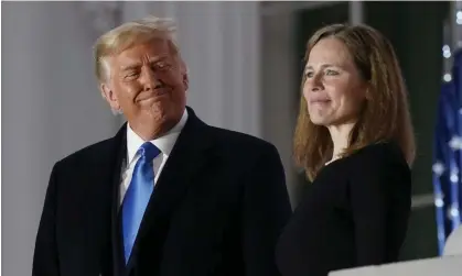  ?? Photograph: Patrick Semansky/AP ?? Amy Coney Barrett with Donald Trump after being sworn on to the court in October 2020.